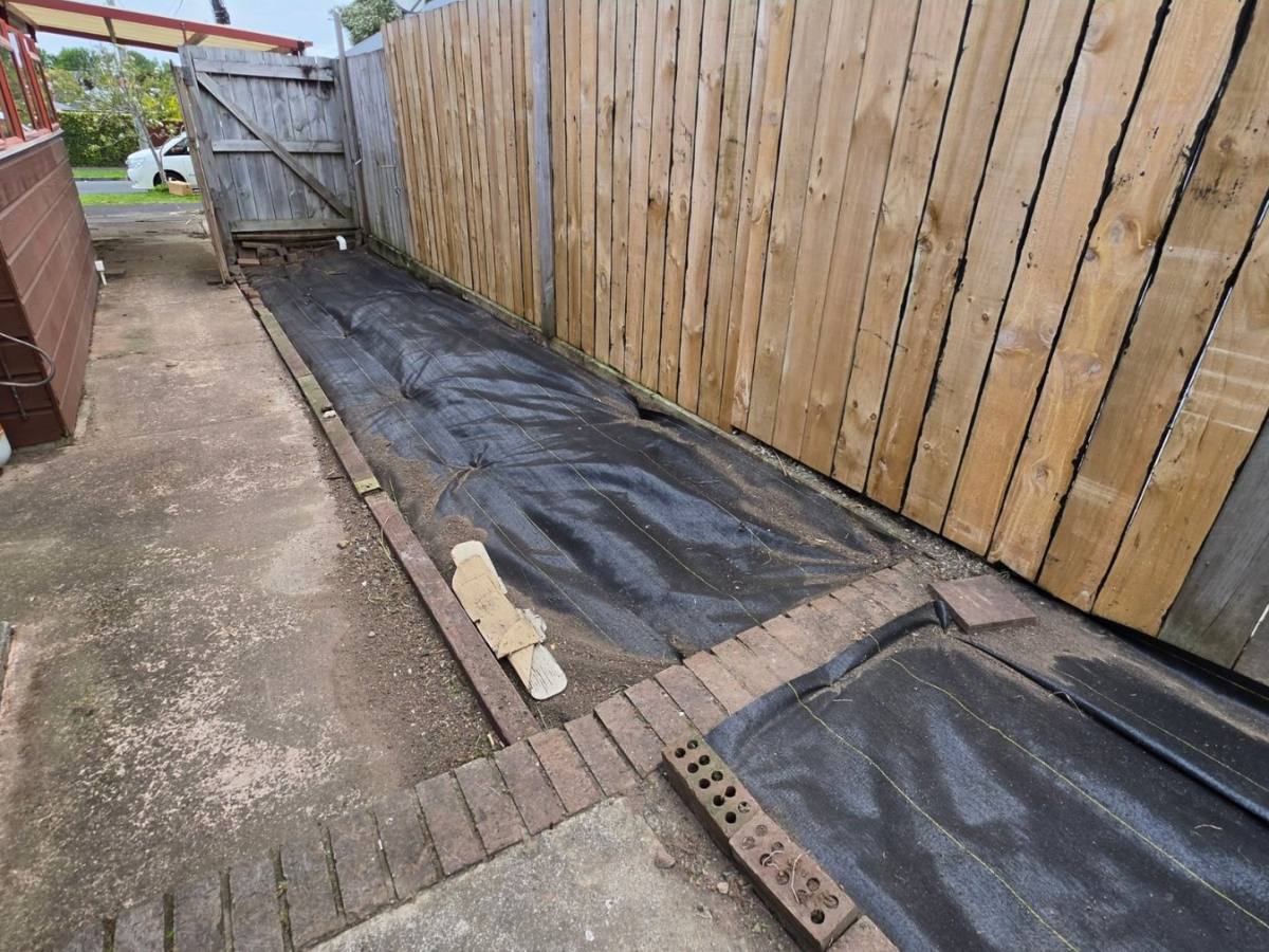 After: fence-line garden bed